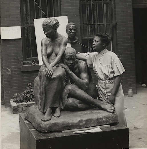 Augusta Savage with her sculpture “Realization,” 1938. Photograph by Andrew Herman. Schomburg Center for Research in Black Culture, New York Public Library